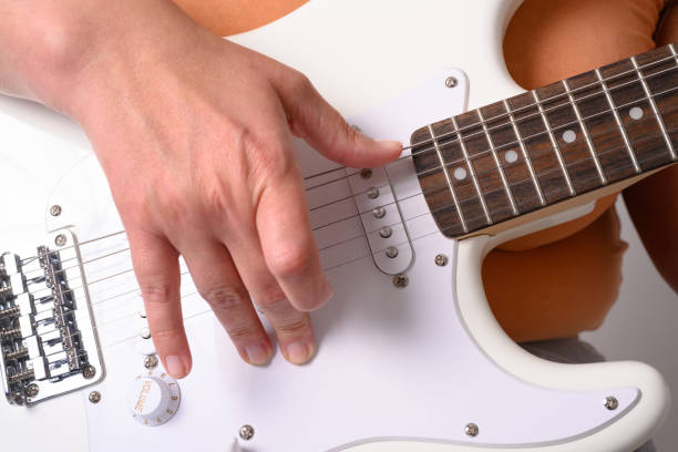 How to Hold the Riff Master Guitar