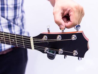 How to Hold the Riff Master Guitar