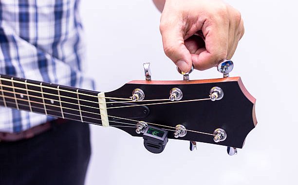 How to Hold the Riff Master Guitar